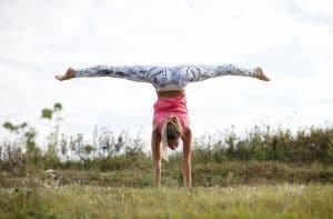 girl stretching outside - splits