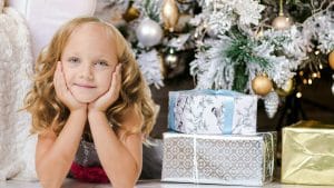 girl with christmas gifts